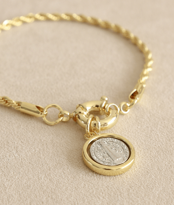 pulsera san benito acero dorado